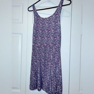 ADORABLE sun dress with an open back and swoop neck line